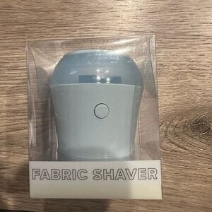 Fabric shaver and ice facial roller